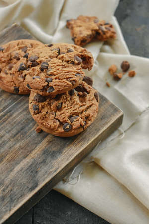 Chocolate Cookie on Wooden Tableの写真素材