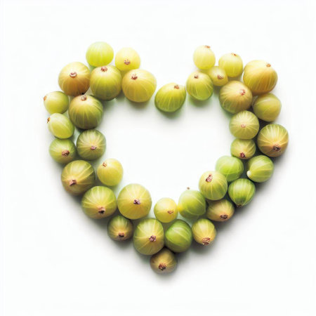 Green gooseberries in the shape of a heart on a white backgroundの素材