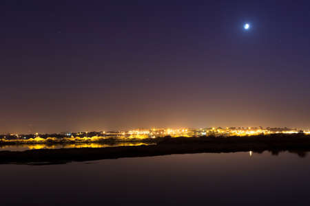 The tejo river and the city on background.の写真素材