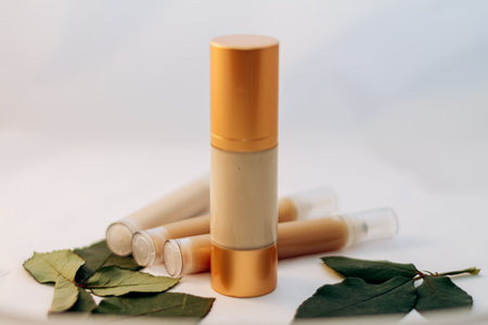 A bottle with a cosmetic product for skin or hair care. Copy space for text.の写真素材