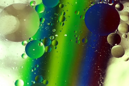 Colored bubbles of oil mixed with water