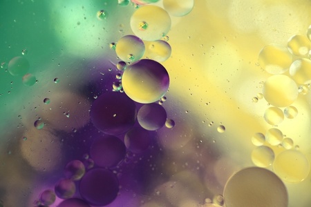 Colored bubbles of oil mixed with water