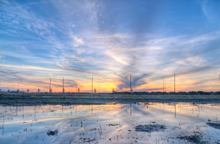 Sunset reflecting over a lakeの写真素材