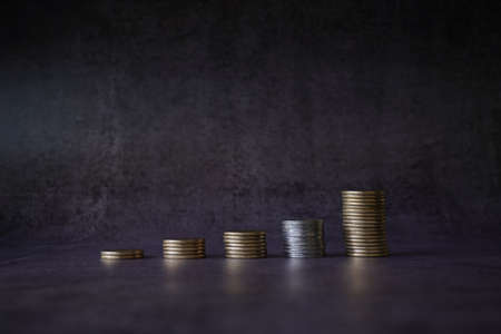 Money growth Saving money. Upper tree coins to shown concept of growing business  . Stock Photoの写真素材