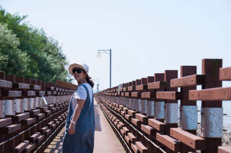 Woman on the bridgeの写真素材