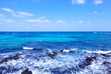 Beautiful beach with blue sea and sky in Okinawa, Japan.の写真素材