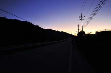 Sunset on a mountain road in south korea, sunsetの写真素材