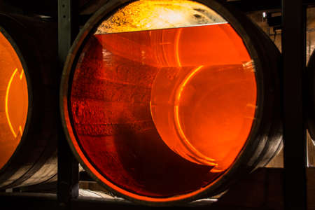 Transparent bottom barrels with Irish whiskey of different age (e.g. 8, 12, 14 years) in Jameson Distillery, Dublinのeditorial素材