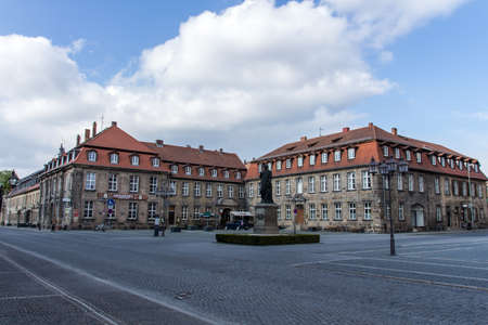 Statue of Jean Paul also known as Johann Paul Friedrich Richter who was a German Romantic writer and was best known for his humorous novels and stories in the background is the Postei building of Bayreuthのeditorial素材