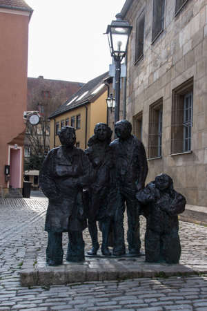 Statue showing a familiy standing close to the Church of the Holy Spirit in German as referred by the City Church of the Holy Trinity Which is located in the Historic Area of the city of Bayreuthのeditorial素材