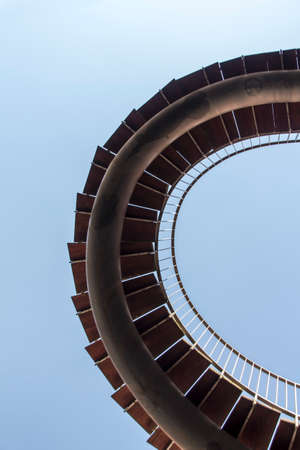 Rewriting stairs sculpture in form of a double helix with infinite stairs, the sculpture is 9 meter high and was designed by Olafur Eliasson in 2004, it is located in the courtyard of the KPMG office buildingのeditorial素材