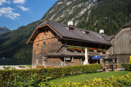 Buildings made of wood of the local fishery St. Bartholomae, the fishing hut is located at the Koenigsseeのeditorial素材