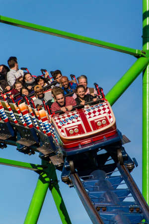 The Alpinabahn rollercoaster at Oktoberfest is a famous fun ride and attracts many peopleのeditorial素材