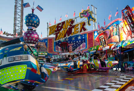 Carousel "Break Dancer" in motion on Theresienwiese at Oktoberfestのeditorial素材