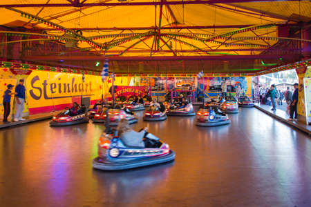 Bumper car rides during Oktoberfest attract many people and is always funのeditorial素材