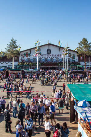 Facade and entrance of the Schottenhamel beer tent with people standing in frontのeditorial素材