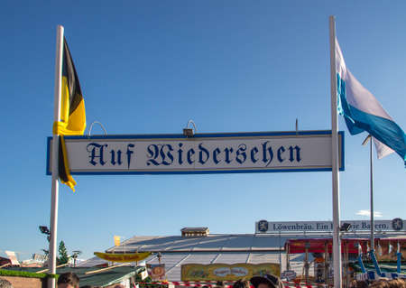 The beer garden of the Braeurosl beer tent with the exit signのeditorial素材