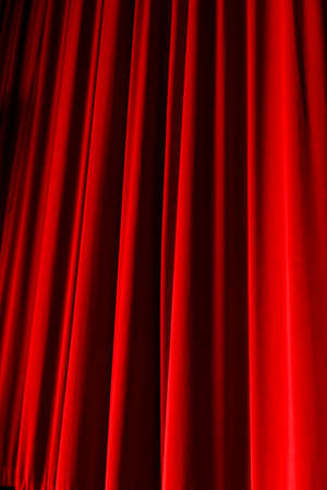 Red drop curtain on a stageの写真素材