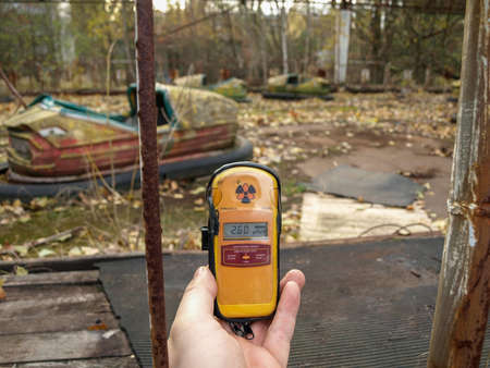 Former amusement park with bumper cars in Pripyat, the ghost town in the Chernobyl Exclusion Zone which was established after the nuclear disasterの写真素材