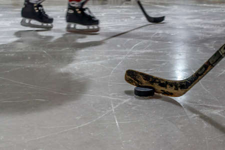 Ice hockey players practicing on the iceの写真素材
