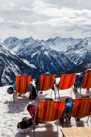 View on the Hintertuxer Glacier (Tuxer Ferner) mountain panorama from Penkenjoch in Tyrol, Austria with canvas chairs in the frontのeditorial素材