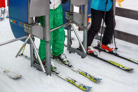 The ski lift Sun Jet at the Horberg mountain in Tyrol, Austria with people in the queue for a lift to the mountaintopのeditorial素材
