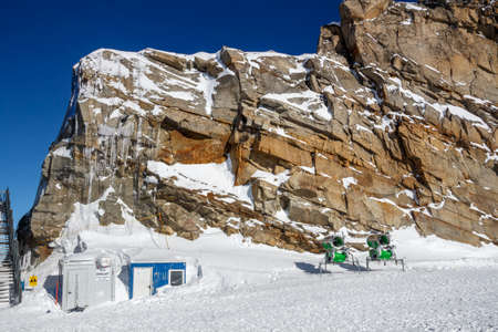 On top of the Hintertuxer Glacier (Tuxer Ferner) in Tyrol, Austria with two snow-making machines...