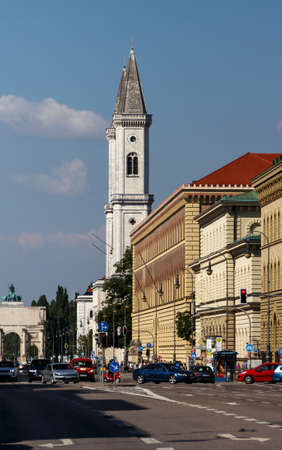 The Bavarian State Library building in Munich with the Catholic Parish and University Church St. Louis (Ludwigskirche) in the backgroundのeditorial素材
