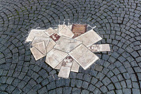 White Rose memorial with leaflets in front of the main building of the Ludwig Maximilians University in Munich to remember the student group White Rose that formed an active opposition against the Nazi regimeのeditorial素材