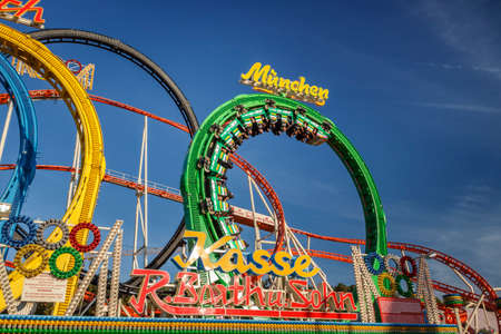 Munich, Germany - September 24, 2016: The Olympia Looping rollercoaster at Oktoberfest is a famous fun ride and attracts many peopleのeditorial素材
