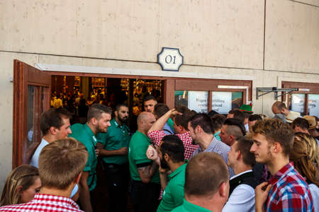 Munich, Germany - September 24, 2016: Closed entrance of the Winzerer Faehndl beer tent with bouncers and unidentified people waiting in frontのeditorial素材