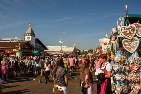 Munich, Germany - September 24, 2016: Main street on Theresienwiese fairground with large beer tents and sales stallsのeditorial素材