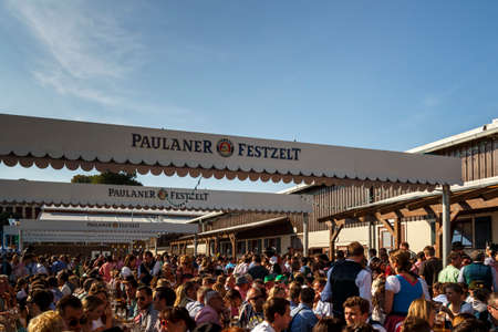 Munich, Germany - September 24, 2016: Beer garden of the Winzerer Faehndl beer tent with unidentified people enjoy drinking beerのeditorial素材