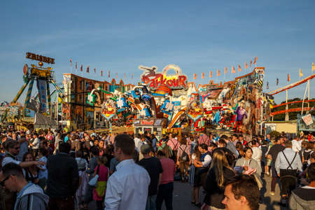 Munich, Germany - September 24, 2016: Main street on Theresienwiese fairground with large beer tents and sales stallsのeditorial素材
