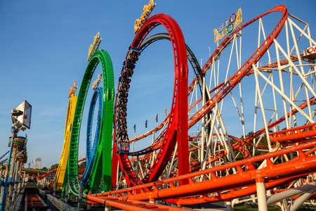 Munich, Germany - September 24, 2016: The Olympia Looping rollercoaster at Oktoberfest is a famous fun ride and attracts many peopleのeditorial素材