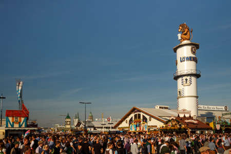 Munich, Germany - September 24, 2016: Loewenbraeu beer tent with unidentified people on the main streetのeditorial素材