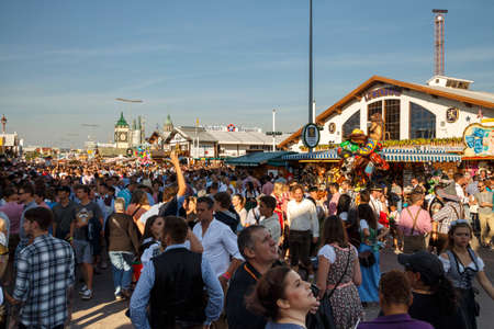 Munich, Germany - September 24, 2016: Main street on Theresienwiese fairground with large beer tents and sales stallsのeditorial素材