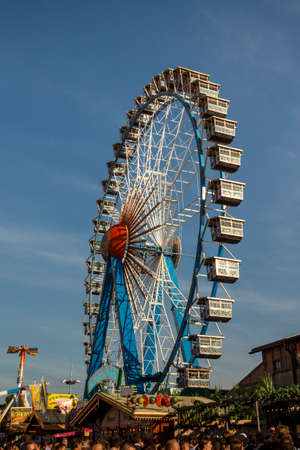 Munich, Germany - September 24, 2016: Ferris wheel on the fairground of the Octoberfest in Munichのeditorial素材