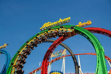 Munich, Germany - September 24, 2016: The Olympia Looping rollercoaster at Oktoberfest is a famous fun ride and attracts many peopleのeditorial素材