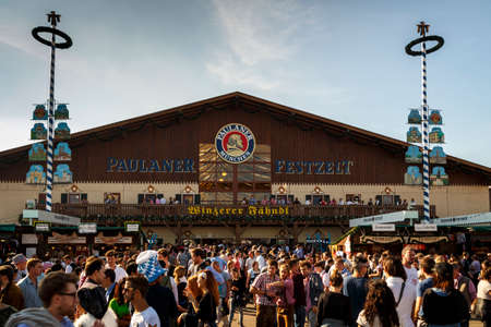 Munich, Germany - September 24, 2016: Facade and entrance of the Winzerer Faehndl beer tent with unidentified people standing in frontのeditorial素材