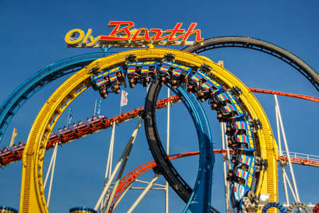 Munich, Germany - September 24, 2016: The Olympia Looping rollercoaster at Oktoberfest is a famous fun ride and attracts many peopleのeditorial素材