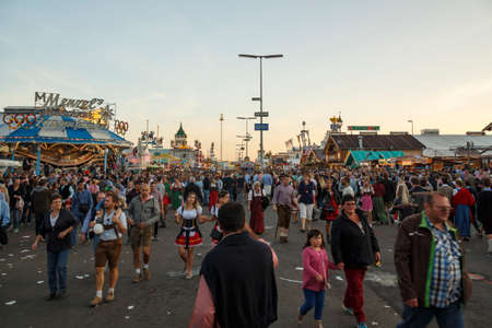 Munich, Germany - September 24, 2016: Main street on Theresienwiese fairground with large beer tents and sales stallsのeditorial素材
