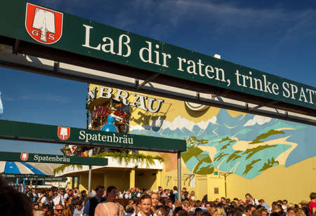 Munich, Germany - September 24, 2016: Outside the Ochsenbraterei beer tent with unidentified people celebrating Octoberfest in the beer gardenのeditorial素材