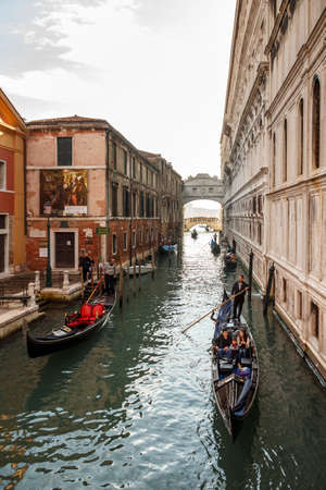 Venice, Italy - November 12, 2016: Canal in Venice with gondolasのeditorial素材