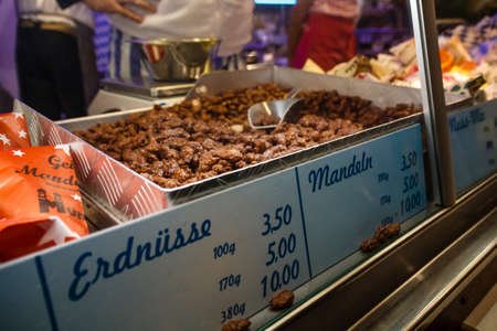 Munich, Germany - September 26, 2015: Geier's Mandelkueche stall on Theresienwiese with almonds and...
