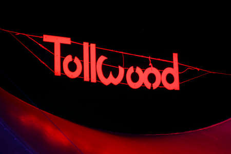 Munich, Germany - November 30, 2016: Tollwood winter festival in Munich during the evening hours with the Tollwood sign on top of a tentのeditorial素材