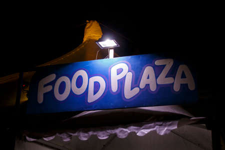 Munich, Germany - November 30, 2016: Tollwood winter festival and christmas market in Munich during the evening hours with illuminated barsのeditorial素材