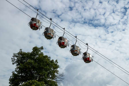 L'Alpe d'Huez, France - August 19, 2019: Ski resort L'Alpe d'Huez and funicular