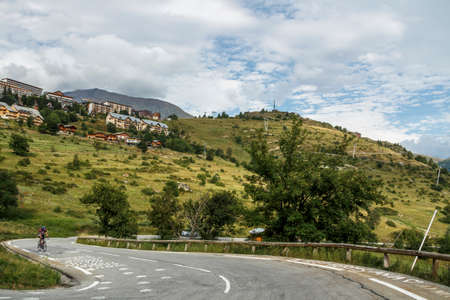 L'Alpe d'Huez, France - August 19, 2019: Ski resort and famous climb to L'Alpe d'Huez in summerのeditorial素材