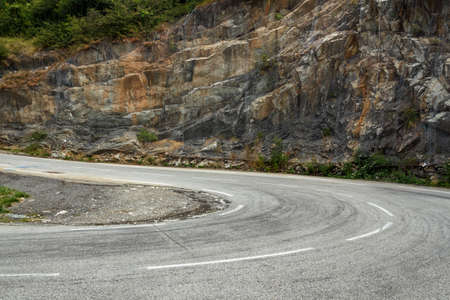 L'Alpe d'Huez, France - August 19, 2019: Ascent of the famous climb to L'Alpe d'Huez and itinerary of the Tour de France at bend 20のeditorial素材